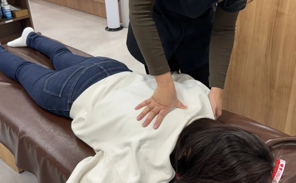 肩首施術